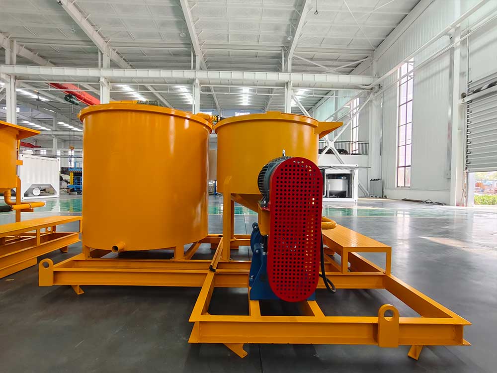 Cement grout mixer and agitator